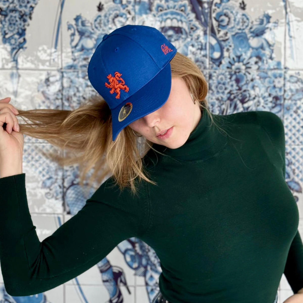 COMBIDEAL O.Leo Cap Blauw - Oranje leeuw & MyTech Earbuds